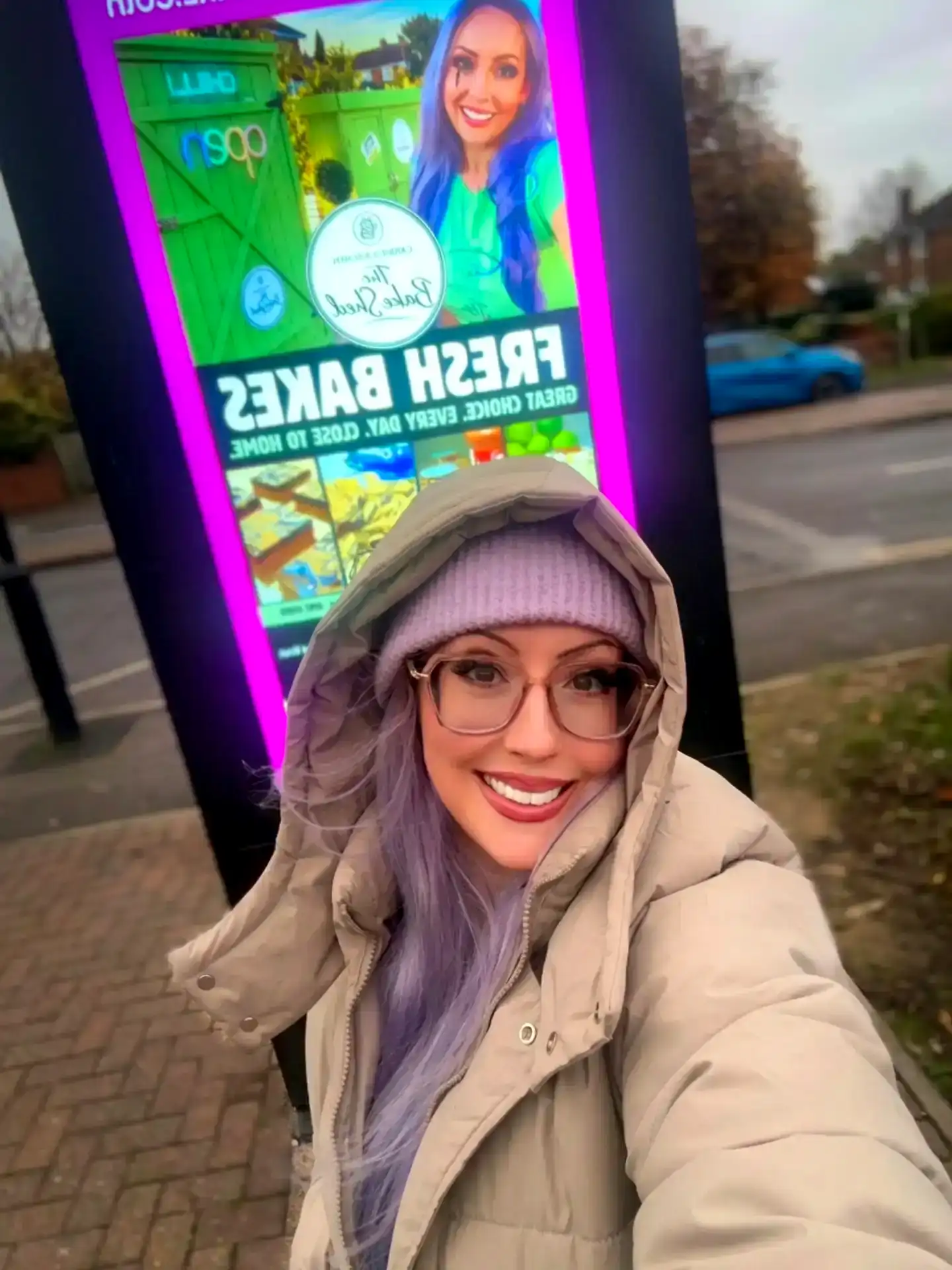 A customer's post live on a FameCake screen