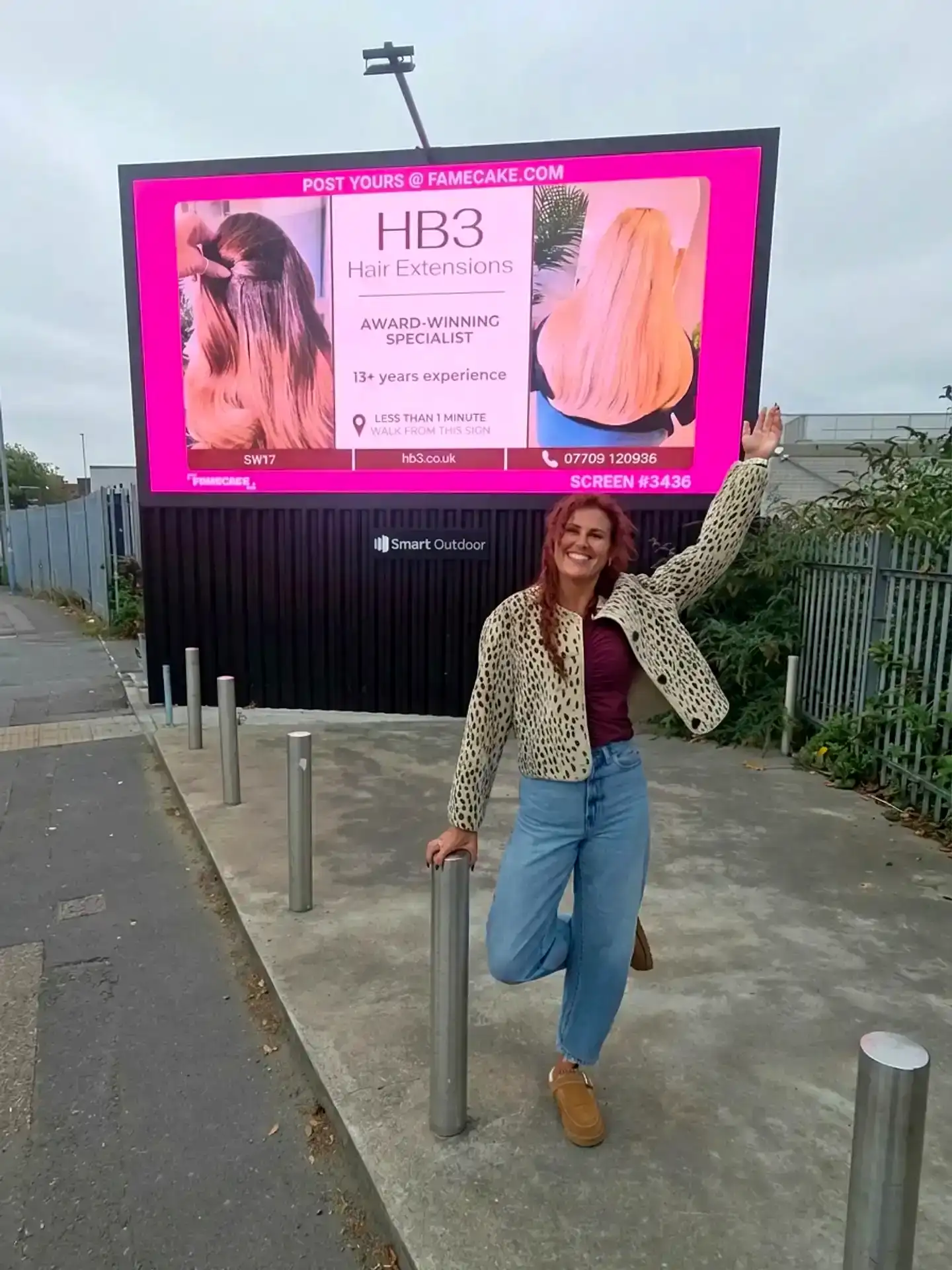 A customer's post live on a FameCake screen
