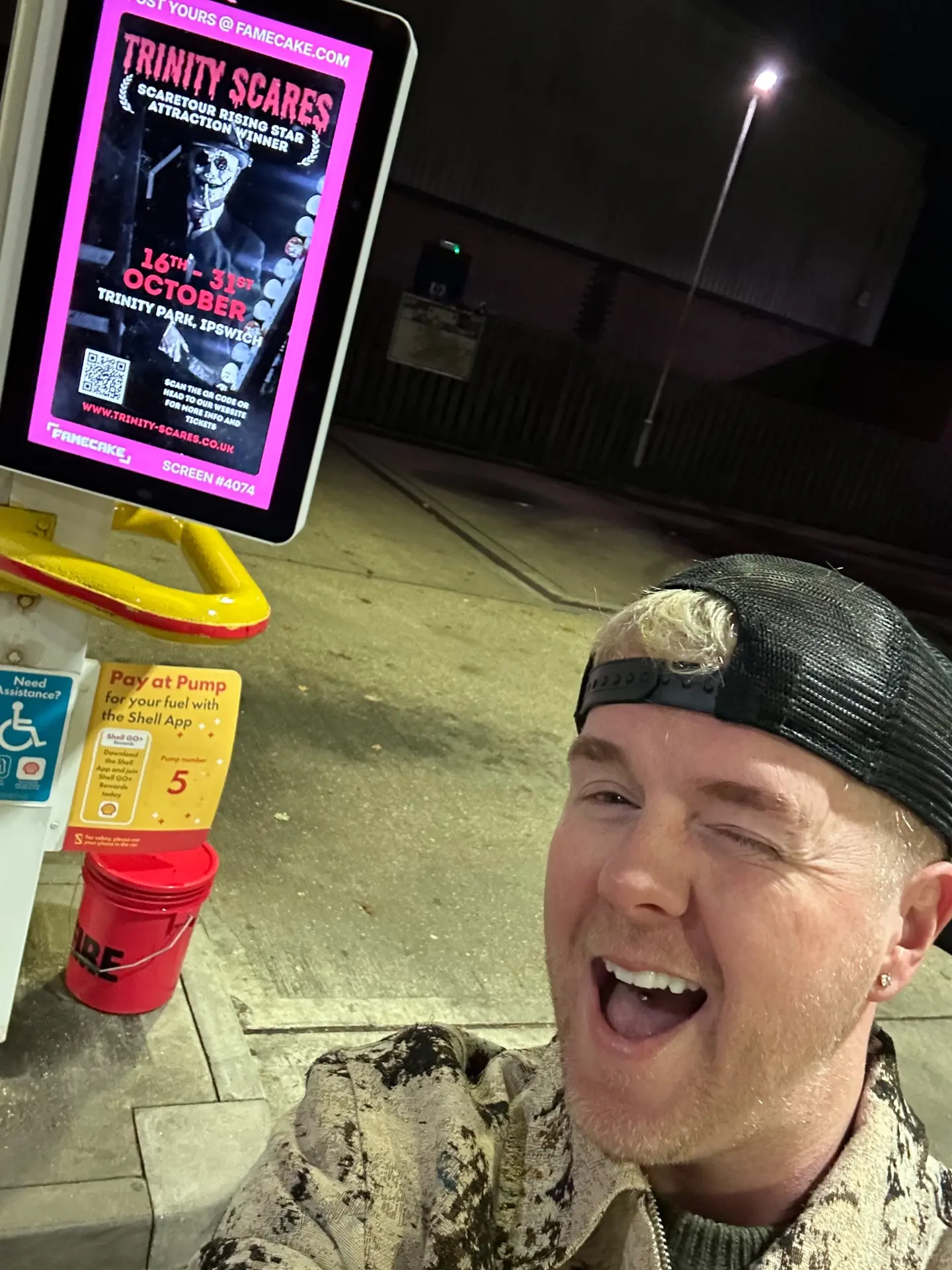 A customer's post live on a FameCake screen